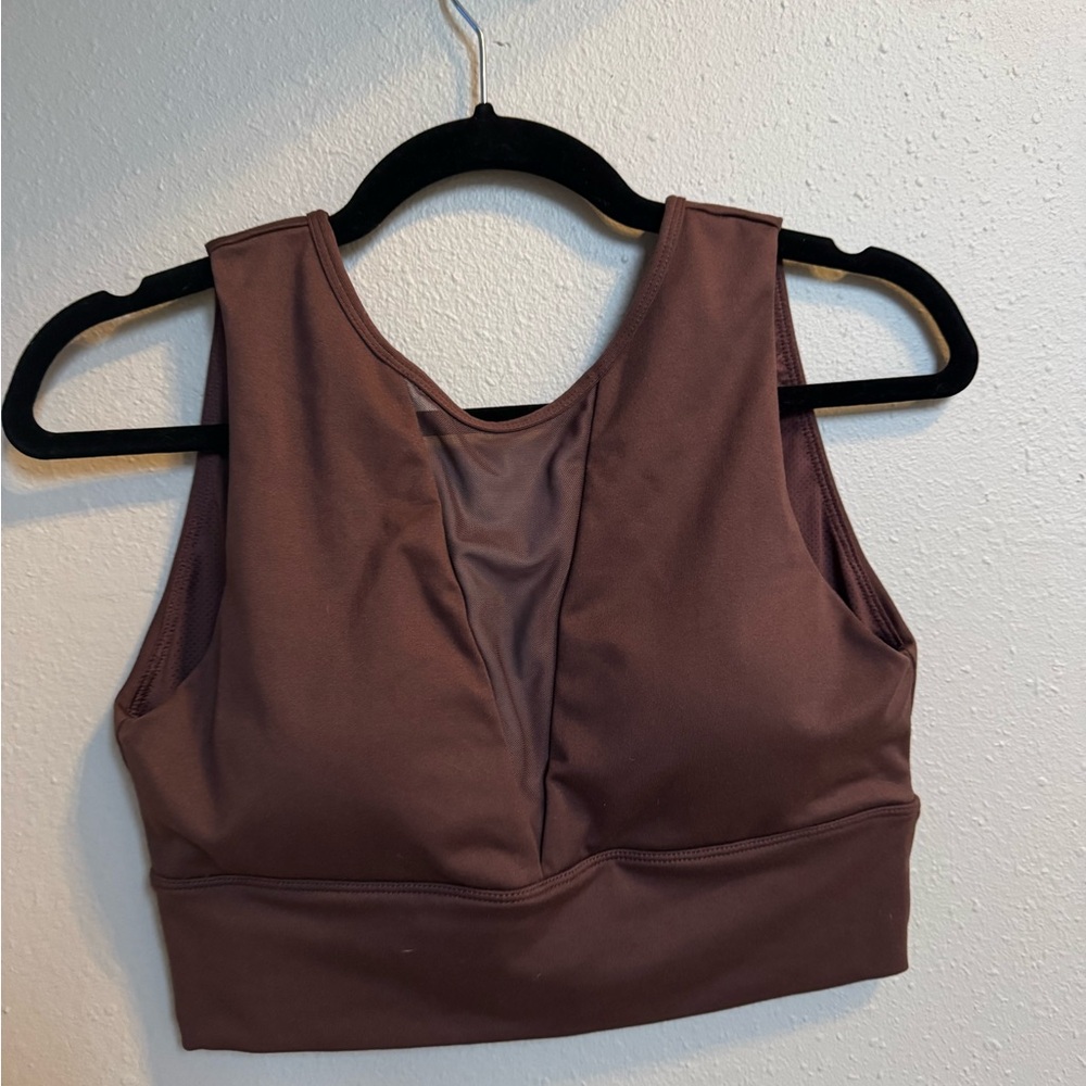 Senita Victoria sports bra (L) fits 36B/C. Never worn, no tags.